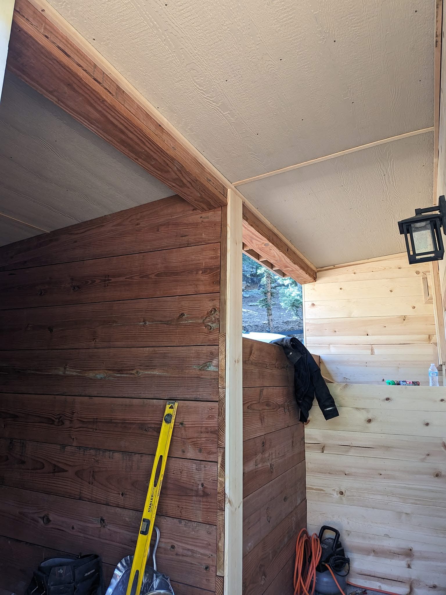 Arena and surrounding forest under winter conditions.