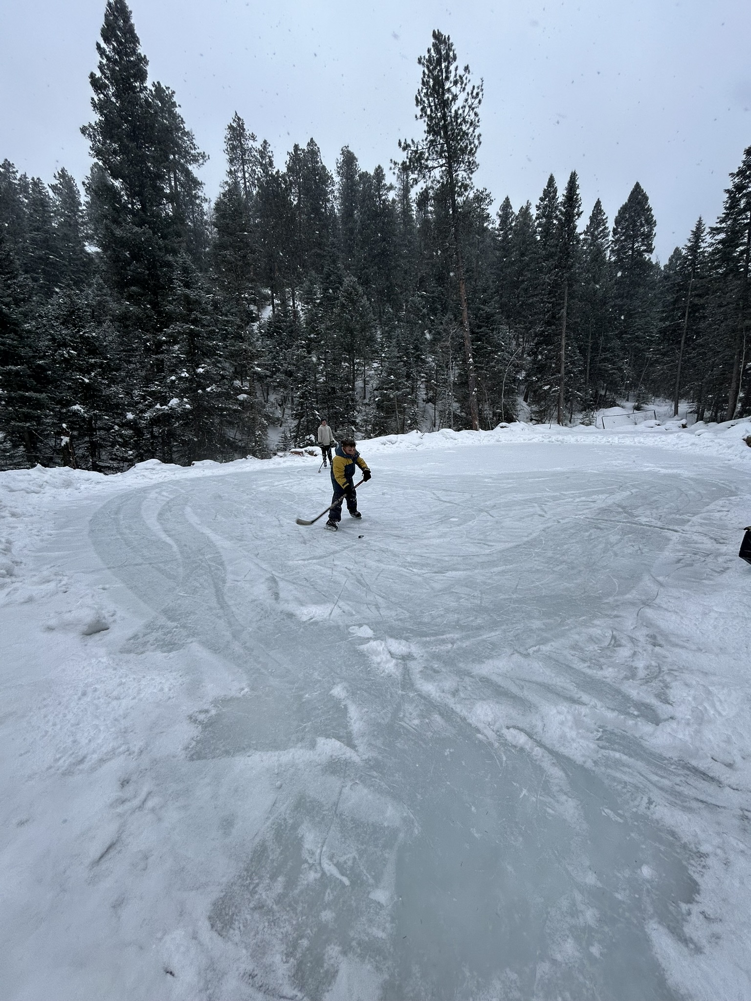 Night skating or rink use with lights in the canyon.